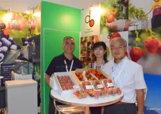 Mr Jim NG (left) of Bubble Gum International Ltd and his Japanese suppliers. The company imports fruit jam, strawberries, tomatoes, peaches, frozen blueberries and apples from Japan.